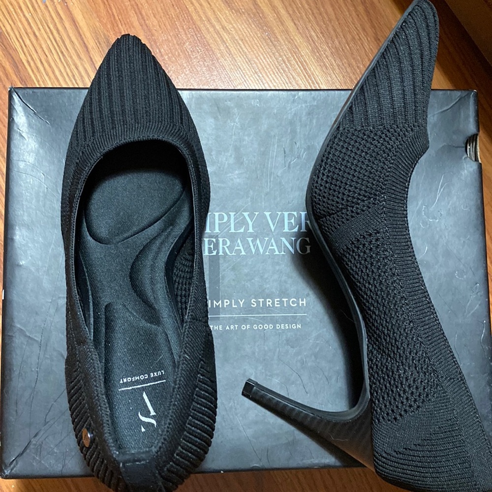 Vera Wang shoes 8.5 are black, like new never worn in box and very nice. In box.